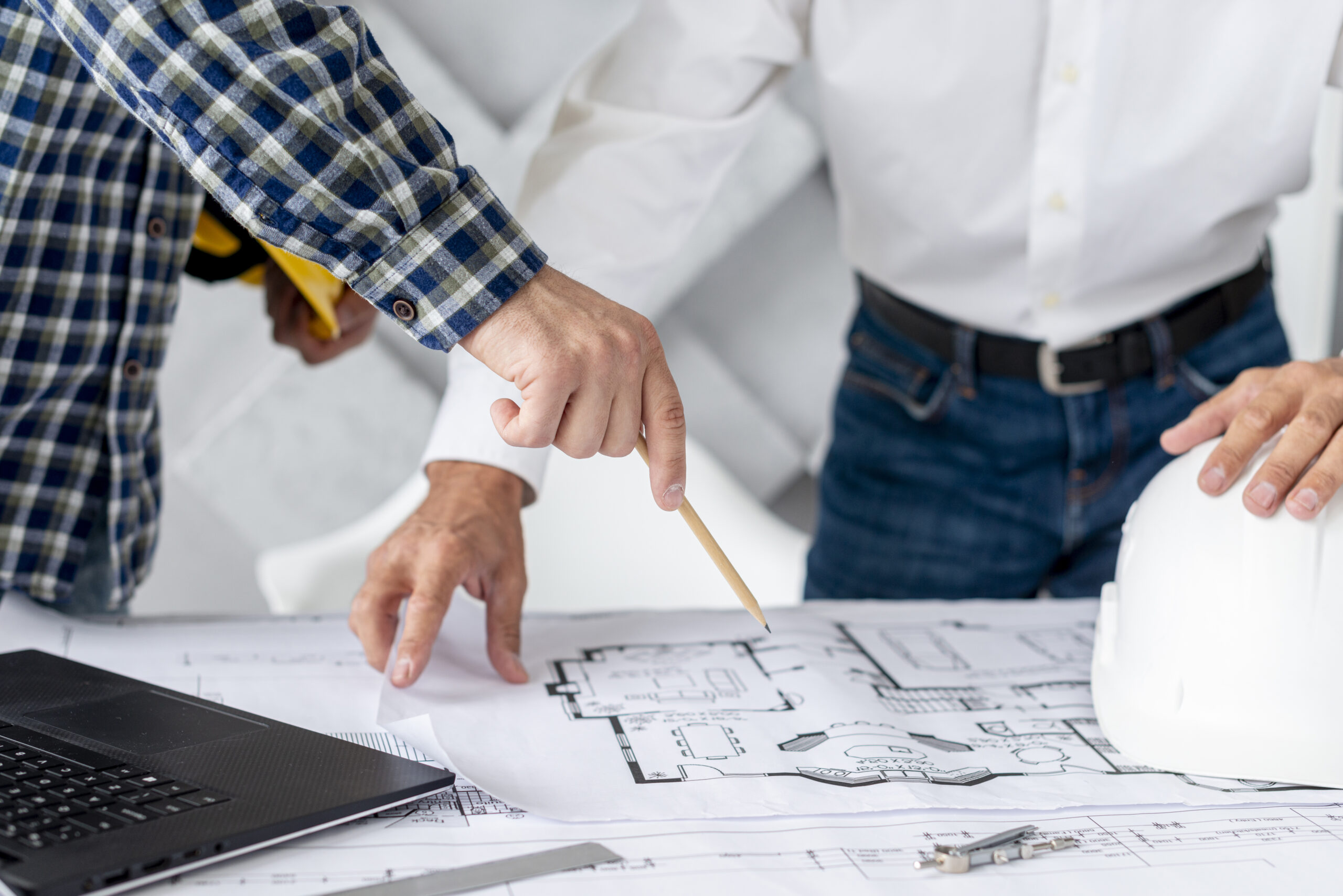 man-discussing-architectural-project-with-client